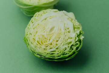Closeup of halved cabbage showing detailed leaf structure