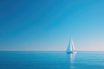 lone sailboat glides across vast calm ocean horizon barely visible