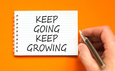 Keep going and growing symbol. Concept words phrase Keep going keep growing on beautiful white...