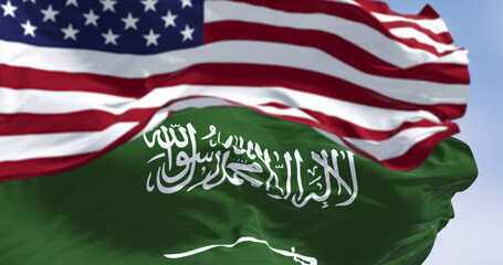 Saudi Arabian and American flags waving together in sky,  3D render