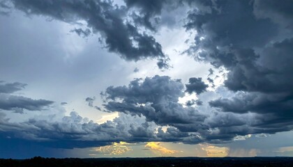 Fototapeta premium darkening sky with storm clouds gathering in the distance stormy atmosphere clouds