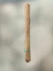 Selective focus of Indian desi cigarette or beedi. Bidi or beedi is indian old version of cigarettes. Which made by dried leaves and tobacco. Also known as beedi, bidi, handmade cigarette
