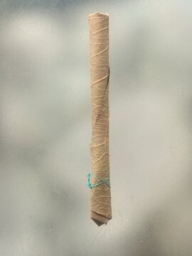 Selective focus of Indian desi cigarette or beedi. Bidi or beedi is indian old version of cigarettes. Which made by dried leaves and tobacco. Also known as beedi, bidi, handmade cigarette
