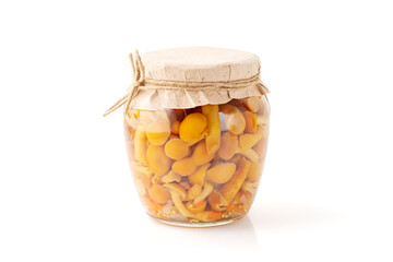 Jar of Pickled Honey Mushrooms with Craft Paper Lid Isolated on White