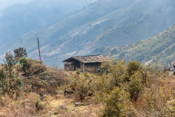 Traditional Sherpa Wooden House in Remote Himalayan Landscape.
