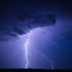 Spectacular Lightning Strike Illuminating the Night Sky During a Thunderstorm