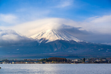 Fuji mountain at Lake Kawaguchiko in Yamanashi, Japan. Mount Fujisan with cloud cap on the peak in the morning