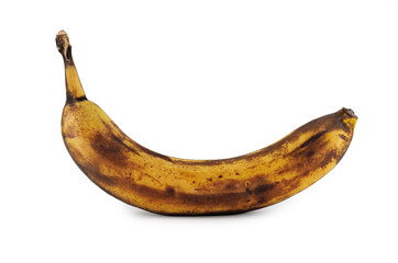 Overripe banana with blackened peel isolated on white background.