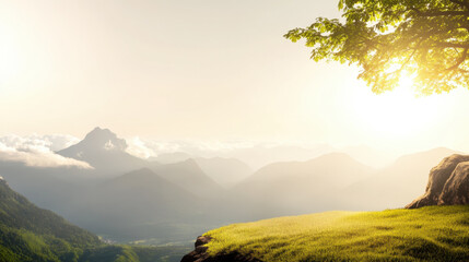 Serene sunrise over fog drenched mountain range, with grassy foreground and tree branch extending into frame, creating peaceful and cinematic atmosphere