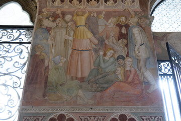 Fresco by Andrea di Bonaiuto in the Spanish Chapel, Santa Maria Novella, Florence, Italy. Martyrdom...