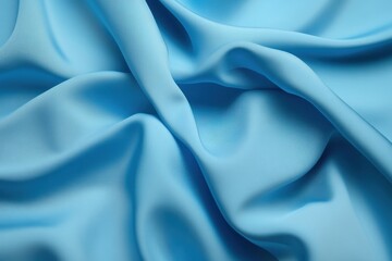 Obraz premium Draped light blue silk fabric texture background