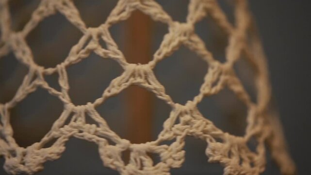 Lace weaving, close-up, rotation