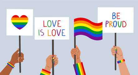 Hands holding LGBT rainbow flags, posters, symbols. Pride month celebration. Gay pride. Flat style. People holding lgbt posters, symbols, signs and flags with rainbows, gay parade. Vector illustration
