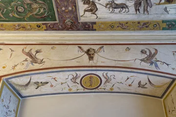 Grotesque-style wall fresco with dancing figure and decorative motifs from Ospedale Vecchio in Lodi, Lombardy, Italy, attributed to 16th-century Lombard school.