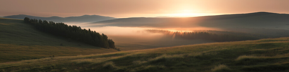 Fototapeta premium Tranquil sunrise over misty mountain landscape with dense forest