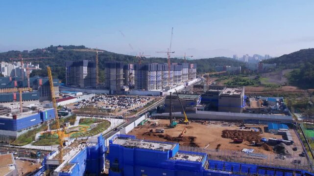 Construction site with cranes and buildings