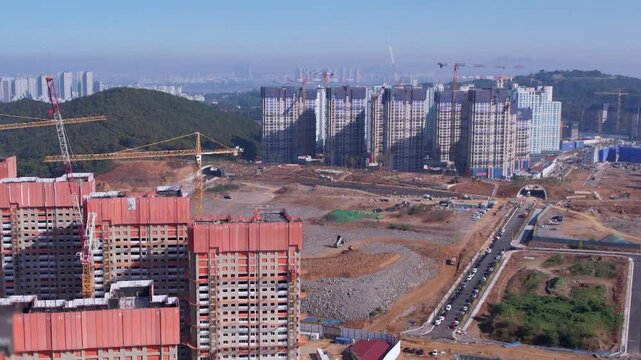 Construction site with cranes and buildings
