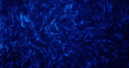 Abstract background. The blue paint with sparkles is bubbling and shimmering