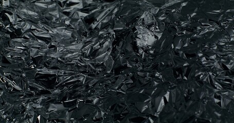Abstract background. The light reflects off the crumpled foil