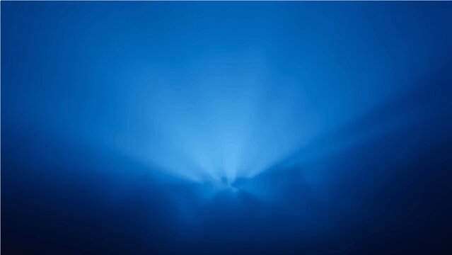 Abstract dark blue sky with light rays and a hint of smoke texture.