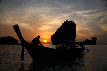 Long-tail boat at Nui Bay at sunset, Phi Phi Don Island, Thailand