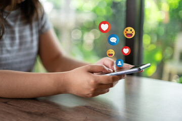 The concept of living on vacation and playing social media. Social media and digital online concept, man using smart phone with Social media. Social Distancing ,Working From Home concept..