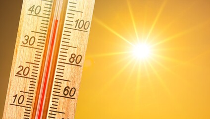 Thermometer indicating high temperature, summer heat wave. Climate change. Rising temperatures.