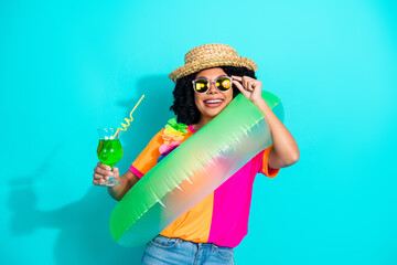 Stylish Young Woman Enjoying Summer Vibes with Vibrant Accessories and Refreshing Drink on Bright...