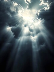 Sunlight shining through dark clouds forming