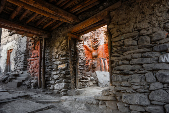 The Ghost Eaters of Kagbeni. An ancient animistic male totem guarding a street of Kagbeni village in Nepal