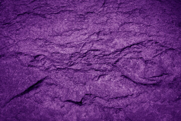 dark and grungy rock texture purple color, abstract stone background. 