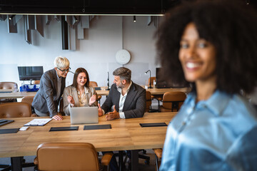 Confident business people in formal clothes working in the office