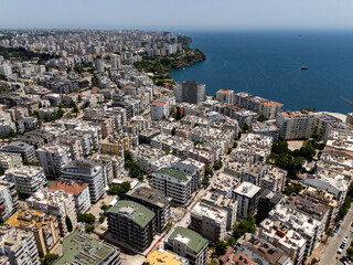Aerial view of Muratpaa district in Antalya, Turkiye, showcasing dense residential buildings and urban landscape