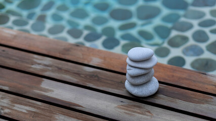 Spa still life with water lily zen stone serenity pool.