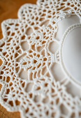 close up of a doily on a table