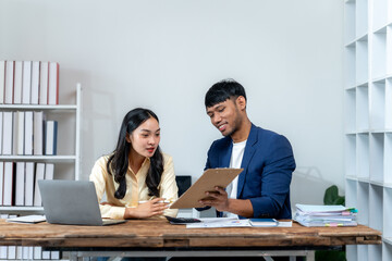 Business Colleagues Discussing Project in Office