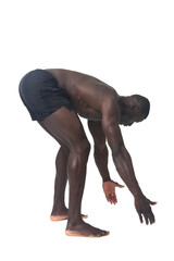 side view of a man wearing shorts lifting something imaginary, large or heavy from the ground on a white background.