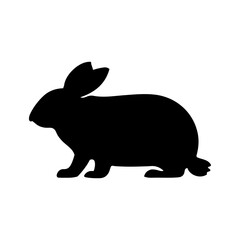 A silhouette of a rabbit with long ears and a short tail stands on a white background in profile view
