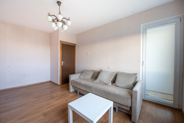 Minimalist Home Interior with Cozy Sofa and Bright Natural Lighting Design