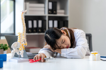 Exhausted Doctor Sleeping at Desk