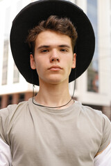 portrait of a trendy young man in the city