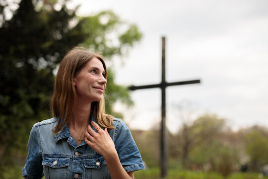 young jesus woman in the city park river