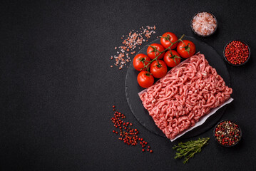Raw ground beef or pork as an ingredient for burgers. Raw minced meat