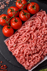 Raw ground beef or pork as an ingredient for burgers. Raw minced meat