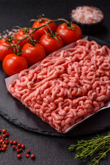 Raw ground beef or pork as an ingredient for burgers. Raw minced meat