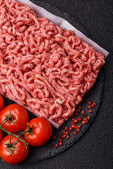 Raw ground beef or pork as an ingredient for burgers. Raw minced meat