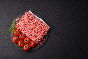 Raw ground beef or pork as an ingredient for burgers. Raw minced meat