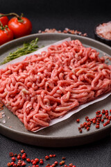 Raw ground beef or pork as an ingredient for burgers. Raw minced meat