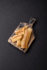 Dried salted fish, snacks or jerky, slices of white fish fillets