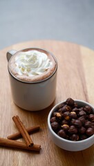 Warm hot chocolate whipped cream hazelnuts cinnamon